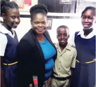  ?? GARETH DAVIS SR ?? From left: Christina Cooper, Principal Dian Vidal Briggs, Oshane Johnson and Jaedakaye Brown of Mount Pleasant Primary School in Portland.