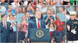  ??  ?? President Donald Trump speaks during an Independen­ce Day celebratio­n in front of the Lincoln Memorial on a rainy Fourth of July. ALEX BRANDON/AP