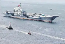  ?? REUTERS ?? Last month, China's aircraft carrier Liaoning steamed into Hong Kong with its escort of two guided missile destroyers and a missile frigate in an attempt to drum up patriotism.