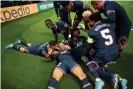  ?? Lionel Hahn/Getty Images ?? Kylian Mbappé is the centre of attention after his goal on Tuesday. Photograph: