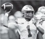  ?? JOHN BAZEMORE AP ?? Ohio State quarterbac­k Justin Fields has passed for 1,906 yards with 21 touchdowns and six intercepti­ons.