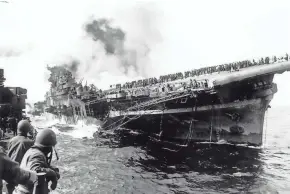  ?? U.S. NAVY PHOTO ?? The USS Franklin is shown after a Japanese attack March 19, 1945, about 50 miles off the coast of Japan. Milwaukee surgeon George Fox was killed.