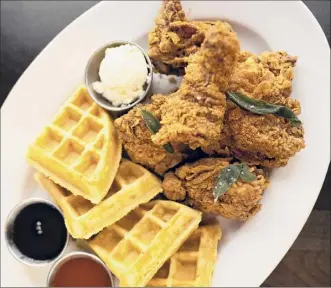  ?? JP ELARIO / Elario Photograph­y for The Nest ?? Chicken and waffles at The Nest in Schenectad­y.