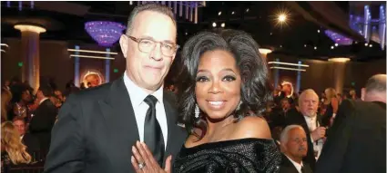  ??  ?? TOM HANKS AND OPRAH WINFREY