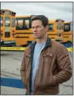  ??  ?? Mark Wahlberg stars in Spenser Confidenti­al as the late author Robert B. Parker’s Boston private eye Spenser. (Netflix/Daniel McFadden)