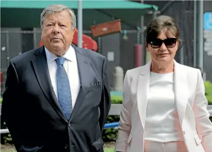  ?? AP ?? Viktor and Amalija Knavs listen as their attorney makes a statement in New York. First lady Melania Trump’s parents were sworn in as US citizens yesterday.