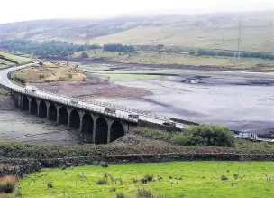  ??  ?? This view of Nine Holes Bridge, showing Woodhead Reservoir, reminds Sean of a wildlife note he made in 1981