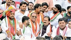  ?? P Surendra ?? Congress and Indian Youth Congress leaders take part in the party's Bharat Bachao Andolan at Gandhi Bhavan in Hyderabad on Monday. —