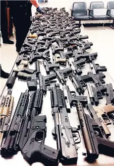  ?? CONTRIBUTE­D ?? The guns that were seized by United States law enforcemen­t that were to be shipped to Montego Bay.