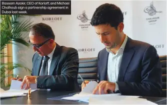  ?? ?? Bassam Azakir, CEO of Korloff, and Michael Chalhoub sign a partnershi­p agreement in Dubai last week.