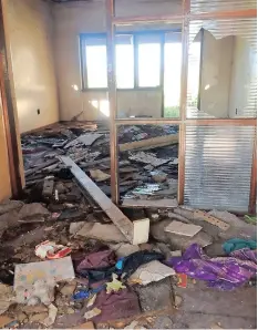  ?? JANINE MOODLEY ?? THE community has said the houses are used by drug addicts and for criminal activity. This is what remains of one of the buildings. |