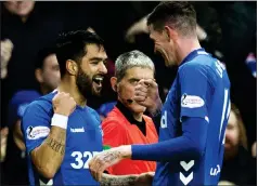  ??  ?? Daniel candeias, left, opened the scoring at Ibrox