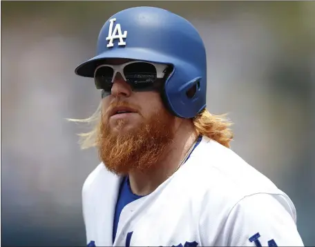  ?? RYAN KANG — THE ASSOCIATED PRESS ?? Los Angeles third baseman Justin Turner is seen during the first inning of a June 11, 2017 game against the Cincinnati Reds. Now he’s a member of the Red Sox and excited to be wearing No. 2 again.