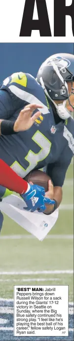  ?? AP ?? ‘BEST’ MAN: Jabrill Peppers brings down Russell Wilson for a sack during the Giants’ 17-12 victory in Seattle on Sunday, where the Big Blue safety continued his strong play. “I feel like he’s playing the best ball of his career,” fellow safety Logan Ryan said.