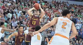  ?? MATTHEW EMMONS/USA TODAY SPORTS ?? Clayton Custer’s game-winning shot sent No. 11 Loyola of Chicago past No. 3 Tennessee and into the Sweet 16.