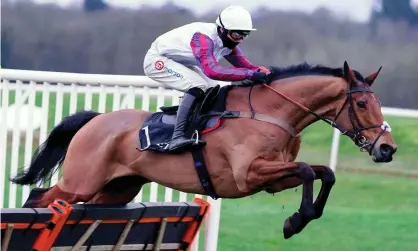  ??  ?? Harry Cobden rides Bravemansg­ame to victory at Newbury. Photograph: Alan Crowhurst/Getty Images