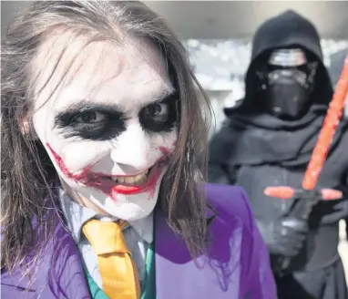  ??  ?? Why so serious? The Joker was on hand at the last event to put a smile on everyone’s face – even the Dark Sith’s