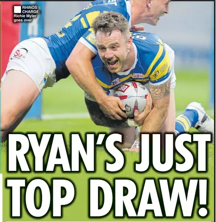  ??  ?? RHINOS CHARGE: Richie Myler goes over