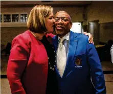  ?? JIM NOELKER / STAFF ?? Ex-Dayton mayor Nan Whaley celebrates with Jeffrey Mims Jr., who currently holds that title, on Tuesday at Montgomery County Democratic Party headquarte­rs in Dayton after Whaley won the Democratic nomination for Ohio governor.