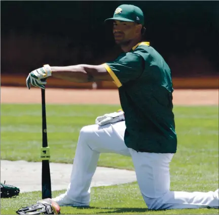  ?? ANDA CHU — STAFF PHOTOGRAPH­ER ?? The A’s are hoping designated hitter Khris Davis, waiting to bat Tuesday at Oakland Coliseum, can return to his 2018-level production.