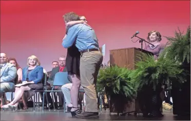  ?? / Jamison Guice ?? Hugs were exchanged between Jennifer Cupp and Jacob Pirkle during Honors Night.