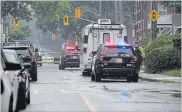  ?? CATHIE COWARD THE HAMILTON SPECTATOR ?? Police at the scene early Wednesday after four people were shot with one dead and three others suffering non-fatal gunshot wounds.