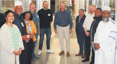  ?? ?? Mayor of Mossel Bay, Dirk Kotzé (beige trousers), and to the right of him, councillor­s Leon van Dyk (portfolio chair for Community Safety) and Mark Furness (portfolio chair for Finance), met faith-based leaders during a site visit and tour of the Joint Operations Centre.