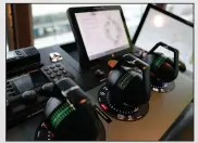  ?? ?? One of the 4 control stations of the British Antarctic Survey Ship Sir David Attenborou­gh is seen, showing the bow thruster controls on the bridge of the ship.