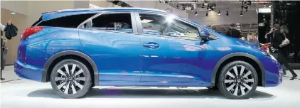  ?? Brendan McAleer /Driving ?? The Honda Civic wagon retains a fun-to-drive personalit­y.