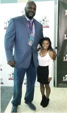  ??  ?? SHAQUILLE O'NEAL AND SIMONE BILES