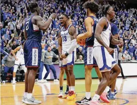  ?? Noah K. Murray/Associated Press ?? Seton Hall’s KC Ndefo (13) reacts after scoring against UConn during the second half on Jan. 18.