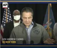  ??  ?? New York state will lower COVID-19 vaccine eligibilit­y from 65 to 60 later this week, Gov. Andrew Cuomo said Tuesday.