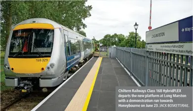  ?? JACK BOSKETT/RAIL. ?? Chiltern Railways Class 168 HybridFLEX departs the new platform at Long Marston with a demonstrat­ion run towards Honeybourn­e on June 23.