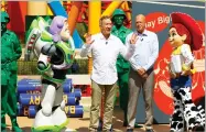  ?? AP PHOTO BY LUIS SANTANA ?? Voice of Toy Story’s Buzz Lightyear Tim Allen, center, attends a dedication to the new Toy Story Land inside of Walt Disney World’s Hollywood Studios in Bay Lake, Fla., during a media preview day on Friday June 30. Tim Allen said, “I’ve been a part of...