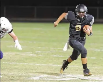  ?? PHOTO BY RANDY HOEFT/ YUMA SUN ?? CIBOLA QUARTERBAC­K ETHAN ARVIZO (RIGHT) heads upfield for a first down during a Sept. 29 game against Valley Vista at Raider Field. Arvizo and the Raiders head to Phoenix tonight to play top-seeded Mountain Pointe in the 6A State Playoffs.