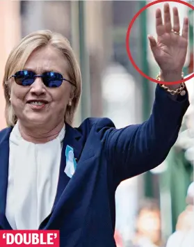  ??  ?? Double? Hillary Clinton on Sunday with her hand circled ‘DOUBLE’