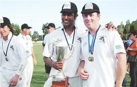  ??  ?? Right - Gamini Kumara (lef) and Daniel Hamilton celebrate together after helping their side achieve division one premiershi­p success in 2010/11.