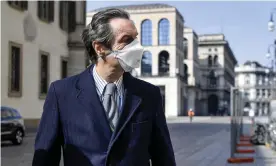  ?? Photograph: Claudio Furlan/AP ?? The governor of Lombardy, Attilio Fontana, in Milan on Sunday, the first day of mandatory face masks when not at home.