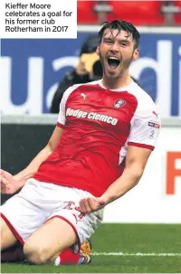  ??  ?? Kieffer Moore celebrates a goal for his former club Rotherham in 2017