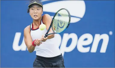  ?? SETH WENIG — THE ASSOCIATED PRESS ?? Ann Li, of Devon, returns against Alison Riske during the second round on Wednesday. Li won, 6-0, 6-3.