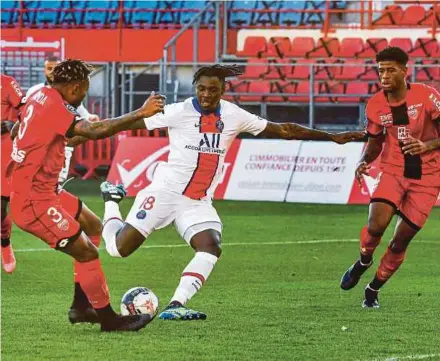  ?? AFP PIC ?? Paris Saint-Germain’s Moise Kean (centre) scores against Dijon in Saturday’s Ligue 1 match.