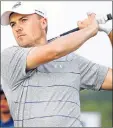  ?? AP PHOTO ?? Jordan Spieth watches his ball after hitting from the fairway on the first hole during Wednesday’s pro-am at the AT&T Byron Nelson golf tournament at Trinity Forest Golf Club in Dallas.