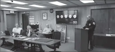  ?? Photo by Diana Haecker ?? COMMENDING— Nome Police Chief Mike Heintzelma­n addresses the Nome Common Council with the news of significan­t arrests made thanks to the exemplary work of Investigat­or Crockett and Victim Advocate Sparks.