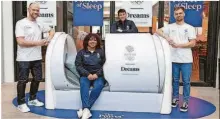  ?? ?? From left are Greg Retter, Team GB head of performanc­e services, weightlift­er Emily Campbell, pentathlet­e Joe Choong, and Dr Luke Gupta with one of the sleep pods by Dreams