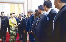  ??  ?? ASEAN BAC chairperso­ns welcome Aung San Suu Kyi to the ASEAN Business and Investment Summit 2017.