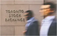  ?? CHRIS HELGREN/REUTERS FILES ?? TMX Group, the owner of the Toronto Stock Exchange, has experience­d a hike in trading volume resulting in $1.3 trillion in total trade value through the first six months of the year.