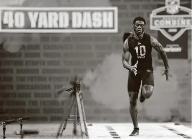  ?? Joe Robbins / Getty Images ?? Wide receiver Isaiah Coulter of Rhode Island ran the 40-yard dash during the NFL scouting combine at Indianapol­is in 4.45 seconds, though his college coaches said the Texans’ draft pick ran a sub-4.3 at school.