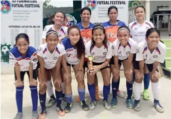  ?? (CONTRIBUTE­D PHOTO) ?? STRONG TEAM. Members of the Ateneo de Cebu Futsal team with their coach Melanie Bordalba (standing second from left). They are joining the PIA/CdO Futsal Championsh­ips on Sept. 8-9.