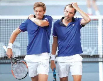  ?? — Reuters ?? France’s Julien Benneteau and Nicolas Mahut during their match against Spain’s Marcel Granollers and Feliciano Lopez.