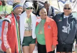  ??  ?? FLASHBACK TO 2015 MANDELA DAY MARATHON: MEC for Co-operative Governance and Traditiona­l Affairs Nomusa Dube-Ncube, centre, celebrates with women’s winner Irvette van Zyl – who broke the 42km Pietermari­tzburg to Howick record by 19 minutes and clocked 2 hours, 47 minutes 15 seconds – is flanked by then premier Senzo Mchunu and uMgungundl­ovu mayor Yusuf Bhamjee.